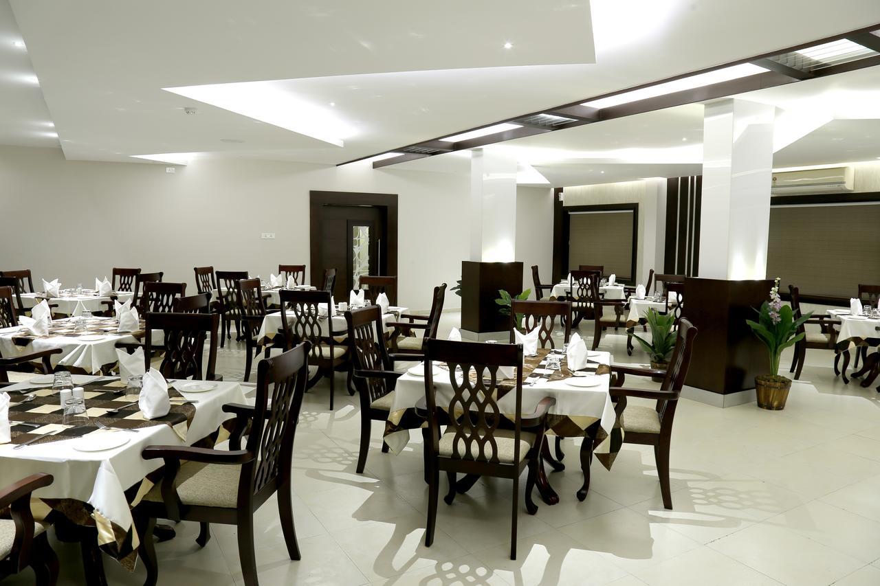 Rydges Inn Kottakkal Buitenkant foto